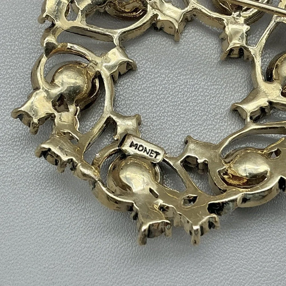 Vintage Monet Brooch Round Wreath Multicolor Rhinestone Gold Tone Pin Costume